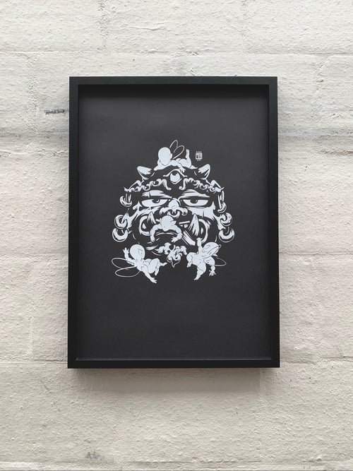 Asian mythical creature with earrings stuck around by faceless elves, printed with water-based white ink on black paper, framed in black and hung against white brick wall.